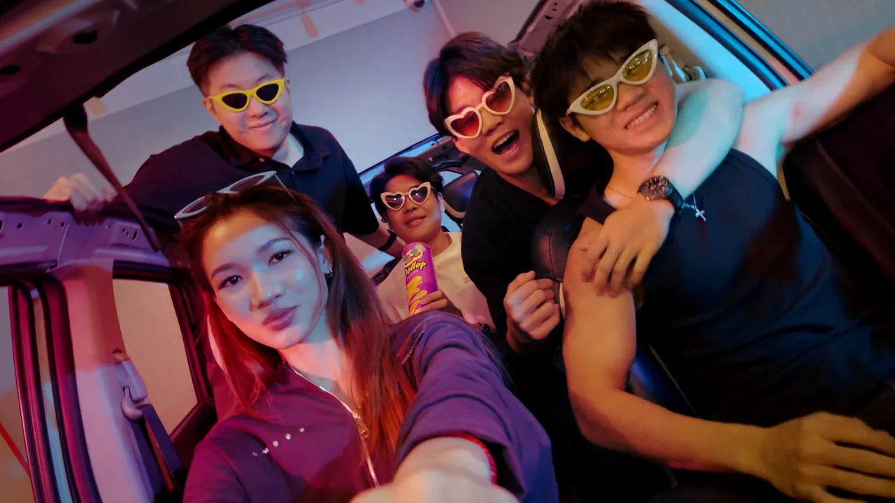 A group of friends posing with sunglasses, from the launch film